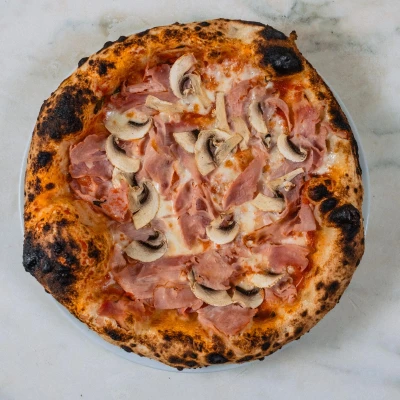 Prosciutto e funghi